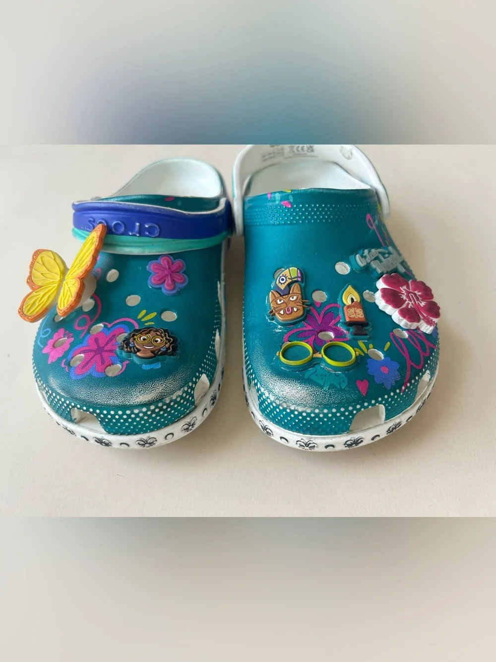 Disney / crocs Teal Kids Clog Sandals with Fun Decorative Charms Encanto